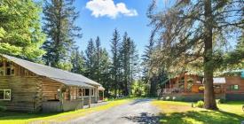 Bear Paw Lodge: The main lodge and log duplex