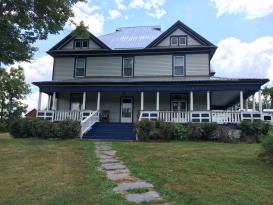 Former Highlander Farmhouse Bed and Breakfast: New roof and paint completed 