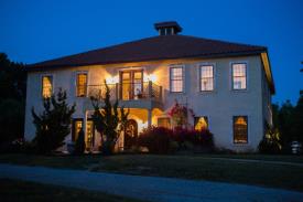 4352 Pea Ridge Road, New Hill, NC: The lovely front elevation at dusk