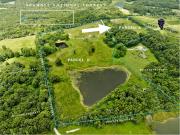 3 LAKEFRONT CABINS + 2 PONDS + SHOP ON 32 ACRES