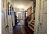 St Francis Cottage LLC: Foyer from Great Room looking back at front door.