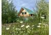 Caribou Cabins: Main house in Summer time
