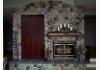 The Country Cedar Inn: Commons Area Fireplace