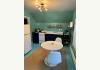Freedom House Bed & Breakfast: Cottage Building Apartment kitchen