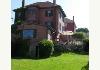 Homestead Inn: House rear, yard, deck, trellis