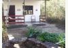 Pousada do Capão: Red chalet with garden