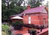 Florence Rose Guesthouse: The Garden Room Patio & Hot Tub Gazebo