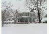 The Old Coe House : Outside house with snow
