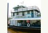 The Covington Inn Bed and Breakfast: view of the boat from the public pier