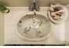 Flowertown Bed & Breakfast : hand painted sink in guest half bath 