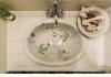 Flowertown Bed & Breakfast : hand painted sink in guest half bath 