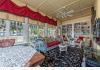 Cotton Palace Bed & Breakfast: Enclosed Porch