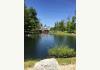 Dollybrook Family Resort: Pond view - rear of main house