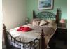 Circa 1894 B&B and Day Spa: Rose Room with cozy Queen bed