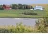 Big House on the Prairie: Farmstead from across lake