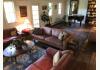 Conyers House Inn and Stable: Two log cabins make up the living room