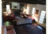 Conyers House Inn and Stable: Living room fireplace