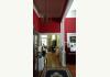 Baker Street Bed  Breakfast: View of Hallway Toward the Entry