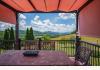 320 Whistle Creek Dr: Back deck hosts 2 permanent arbors