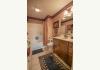 320 Whistle Creek Dr: Full bath adjoining the Americana Room