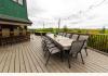 Cedar Pond House: Built-in table on deck