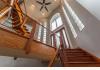 Cedar Pond House: Three story entryway