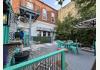 Osage Building : backyard with deck and fountain 2