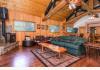 Central Oregon Rural Residential Lodge: Upstairs Treetop living area with propane stove