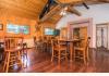 Central Oregon Rural Residential Lodge: Event tables and bedroom entrance