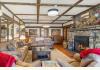 Mt Shasta Ranch Bed and Breakfast: Cozy Parlor with Rock Fireplace